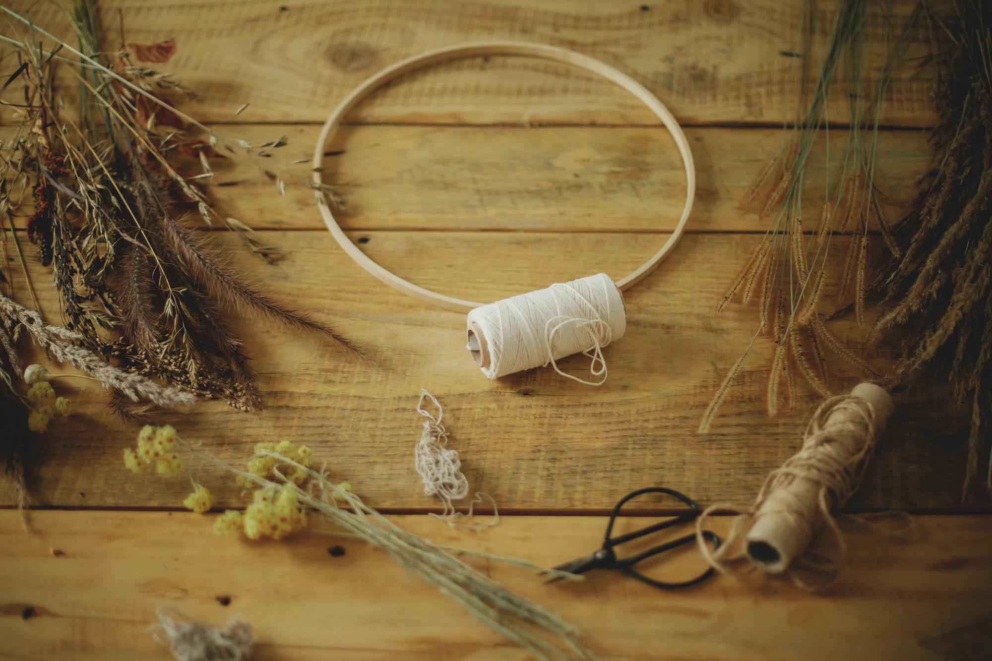 atelier workspace with threads and hoop
